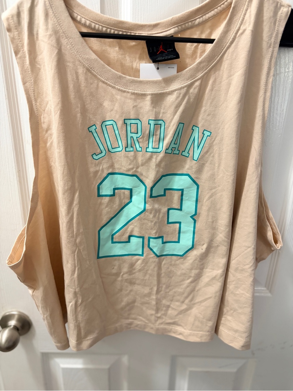 Jordan Women’s Sleeveless Tank Top in Beige with Teal Graphic
